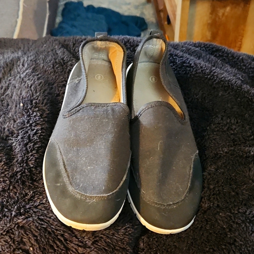 Black slip on casual sneakers. Size 8.